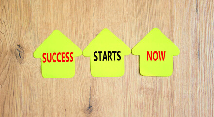 Wall Mural - Success starts now symbol. Concept word Success starts now on beautiful yellow paper house. Beautiful wooden table wooden background. Business motivational success starts now concept. Copy space.