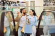 © Prostock-studio - Laughing glad young european couple shopaholics with bags hugging, have fun, enjoy shopping