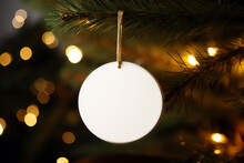 Christmas Tree Decorations Blank Ornament Mockup  With Lights In Blurred Background. Generative AI