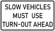 © Anthony - Vector graphic of a usa Slow Vehicles Must Use Turn Out Ahead MUTCD highway sign. It consists of the wording Slow Vehicles Must Use Turn Out Ahead contained in a white rectangle