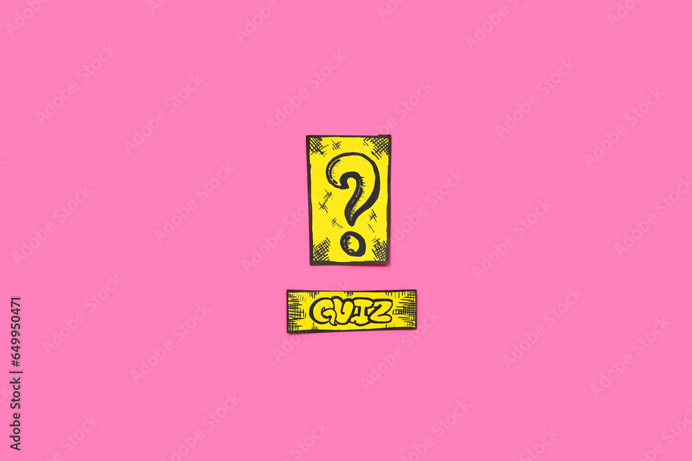 Paper quiz card with question mark on pink background