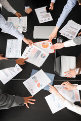 Canvas Print - Group of business consultants working at table in office, top view