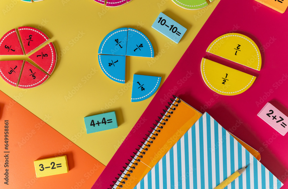Colorful math fractions, numbers, letters on yellow background ...