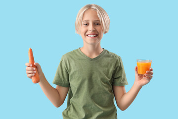 Sticker - Little boy with glass of juice and carrot on blue background