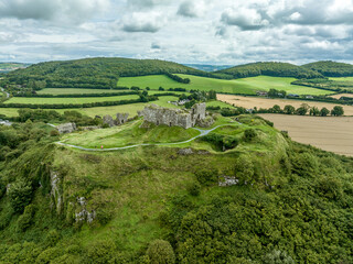 Poster - Aerial view of Dunamase legendary Irish hilltop castle ruin with cloudy blue sky