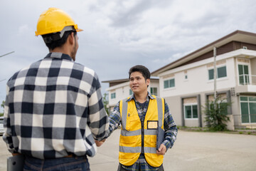 Poster - Architect and engineer shaking hands at job site, the project commissioned by the client, and the custom design before delivery. Interior design and decoration ideas.