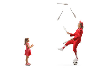 Poster - Little girl watching a juggler and giving an applause