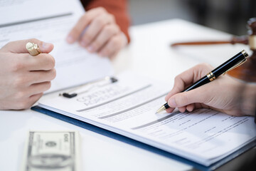 Close up businessman or Lawyer signing contract making a deal, classic business at office in the morning.