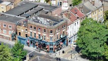 Pub On Street Corner In London, United Kingdom. Typical Town Houses. Aerial