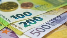 Banknotes 100, 200, 500 Euro. Euro Banknotes Of Various Denominations. Real Euro Money Of Various Colors And Nominals And Metal Coins
