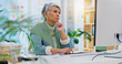 © Wesley JvR/peopleimages.com - Computer, thinking and senior business woman writing in office for planning, idea or research. Online, solution and elderly lady manager checking schedule, plan or proposal with management book notes