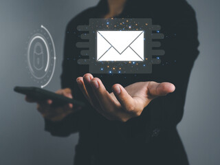 Wall Mural - email, businessman showing electronic mail that is accessed through a smartphone that is secure in m