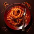 a fork with spaghetti on plate