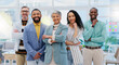 © Wesley JvR/peopleimages.com - Happy creative group, team and confidence in leadership, management or about us at the office. Portrait of confident employee people with smile standing together in teamwork for startup at workplace