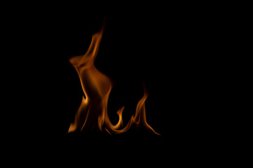 The fire flames is powerful , Shoot in a studio with a black background.	