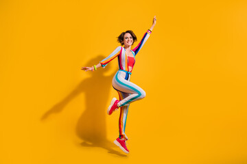 Poster - Photo of pretty cheerful girl jumping isolated vibrant color background