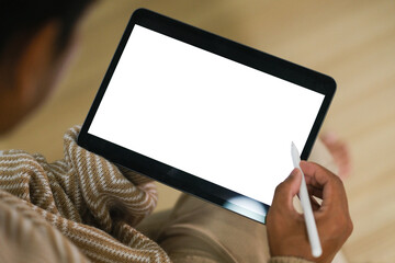 Close-up image a worker man using his digital tablet