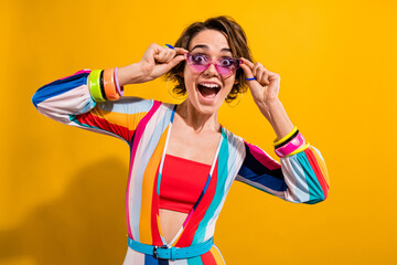 Poster - Photo of positive surprised girl screaming crazy enjoy event occasion ads isolated yellow color background