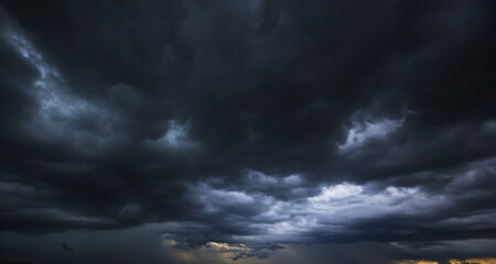 Aufkleber - Bad or moody weather sky and environment.The dark sky with heavy clouds converging and a violent storm before the rain.carbon dioxide emissions, greenhouse effect, global warming, climate change