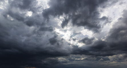 Aufkleber - The dark sky with heavy clouds converging and a violent storm before the rain.Bad or night weather sky and environment. carbon dioxide emissions, greenhouse effect, global warming, climate change