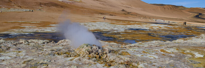 Hverir, Iceland. A surreal, bare orangy-red, geothermal area at the foot of Namafjall. Full of fumaroles, mud pools, steam vents. It's on Route 1. It is also called Namaskard Hverir.