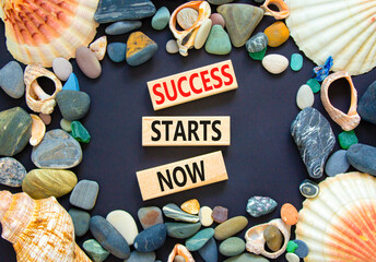 Wall Mural - Success starts now symbol. Concept word Success starts now on beautiful wooden block. Sea shell stone. Beautiful black table background. Business motivational success starts now concept. Copy space.