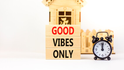 Wall Mural - Good vibes only symbol. Concept word Good vibes only on beautiful wooden block. Black alarm clock. Beautiful white table white background. Business motivational good vibes only concept. Copy space.