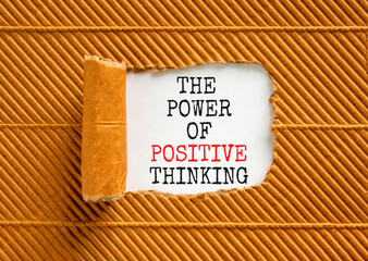 Positive thinking symbol. Concept words The power of positive thinking on beautiful white paper. Beautiful brown background. Business, motivational positive thinking concept. Copy space