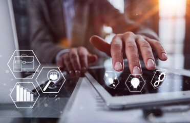 close up. businessman pressing his finger on the screen of the digital tablet