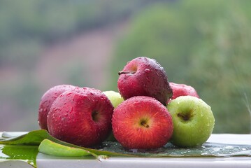 Wall Mural - An arrangement of beautiful red and green fresh juicy apples