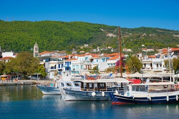 Sticker - Skiathos green island with enchanting beaches the beautiful capital is the town of Skiathos, Greece