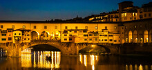 Night Panoramic Of Covered Bridge In Florence Italy