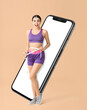 © Pixel-Shot - Big smartphone and surprised young woman with measuring tape on beige background. Weight loss concept