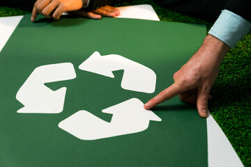 Recycle icon on meeting table in office with business people planning eco business investment on waste management as recycle reduce reuse concept for clean ecosystem. Quaint