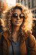 © kapros76 - Tourist woman with curly blonde hair in sunglasses at a crowded tourist attraction taking a selfie in late autumn sunset with sunflares in the background. Image created using artificial intelligence.