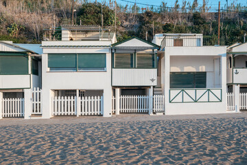 typical white beach houses, cabin houses in mediterranean sea coast