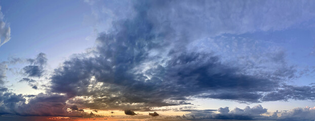 Wall Mural - fantastic colorful sky with dramatic cloud. panoramic sunset skyline background