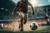 Fototapeta Sport - a soccer player running with the ball