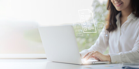 closeup shot of hands using laptop and typing on keyboard, searching information