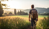 Fototapeta Natura - Male hiker traveling, walking alone Italian Tuscan Landscape view 