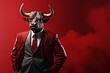 Portrait of a bull in a businessman suit and tie on a isolated background.