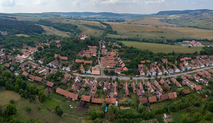 Wall Mural - The fortified church and village of Viscri in Romania	