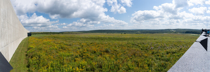 Stoystown, PA, USA: The Flight 93 National Memorial at United Airlines Flight 93 crash site, hijacked in September 11 attacks. Wild flowers and 40 maple groves in circle of embrace