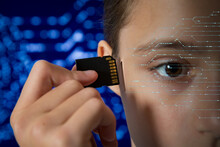 Teenage Girl Plugging SD Memory Card Into Slot In Her Head. Artificial Intelligence, Technological And Computer Dependence, Robotics, Memory Upgrade, Mind Control, Computing