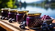 Blueberry jam in glass on a wooden table