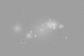 Wall Mural - dust sparks and stars shine with a special light. christmas light effect. glittering particles of ma