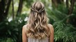 © Cloudyew - A woman with a romantic waterfall braid