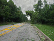A downed tree and branches block a street in an Ohio town after a heavy storm during the night.