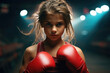little girl boxer in the boxing ring