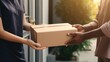© Oulaphone - Woman receiving parcel box from delivery man at home